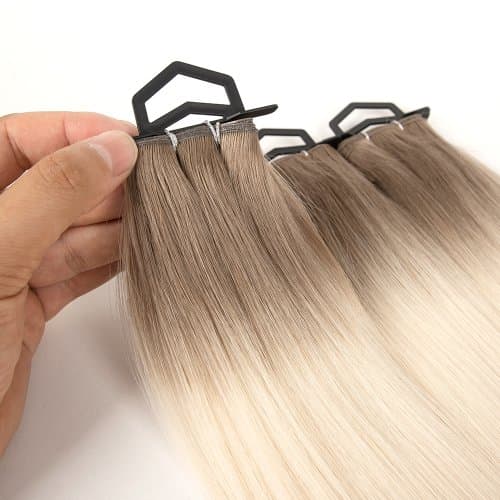 Close view of a professional human hair weft construction
